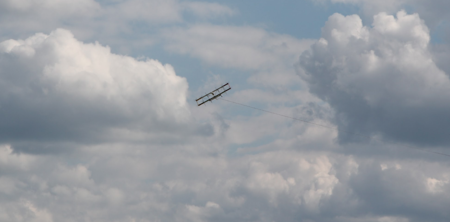 kiteKRAFT kite flying in clouds.